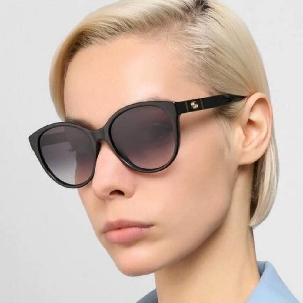 GUCCI GG0631S 001 round sunglass comes black frame with grey gradient lenses